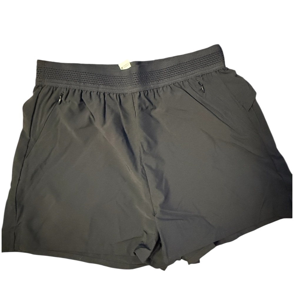 Halara breezeful shorts with ruffle back and zipper pockets small nwot